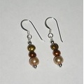 Golden freshwater pearl sterling earrings. Matching necklace with same number E1013 $26.00