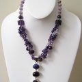 Triple sterling pendant of smokey quartz, amethyst and lapis on triple strand of pearls and amethyst necklace. 